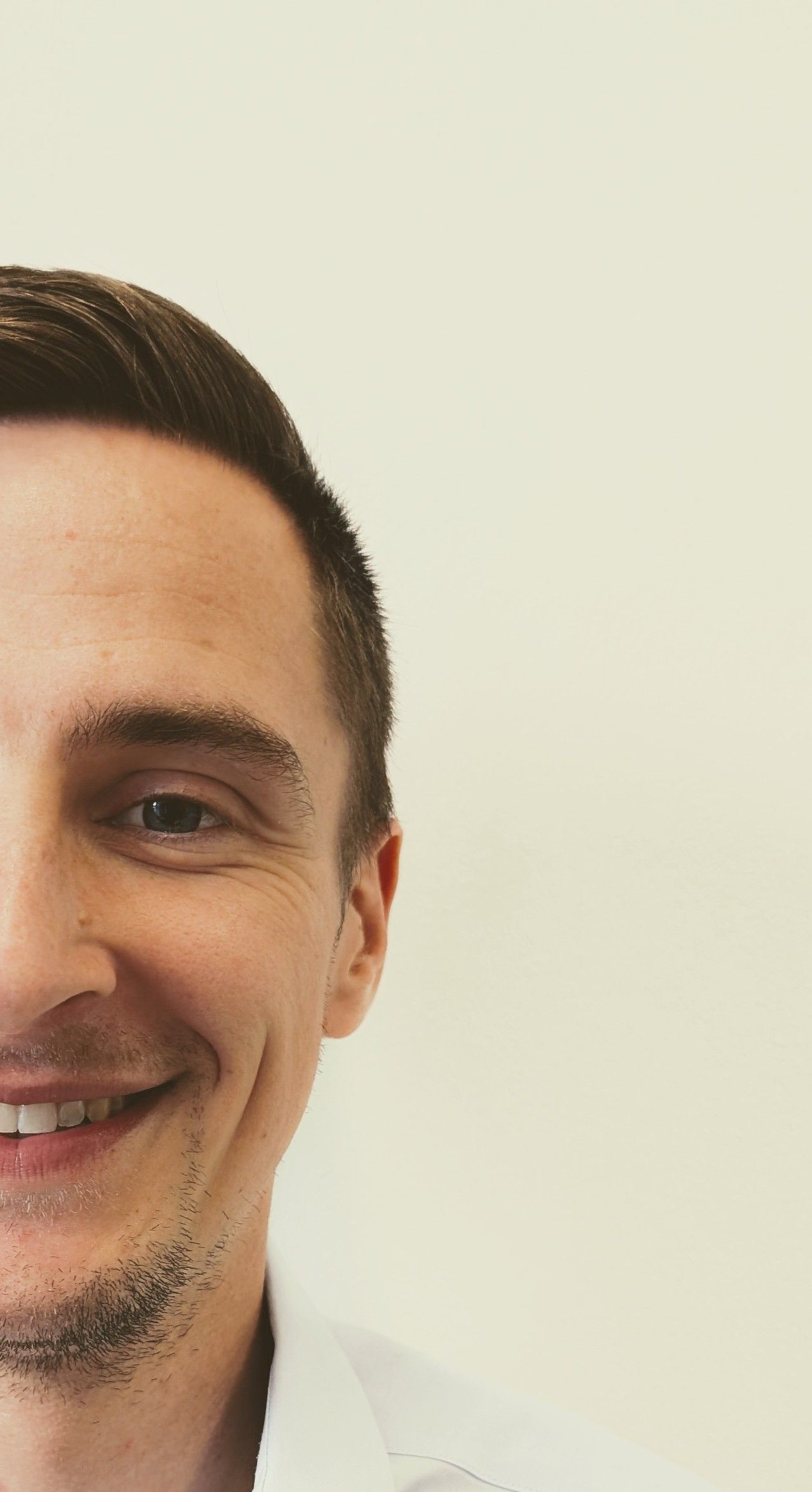 Portrait photo of Stephan Reisenberger (half of the face)